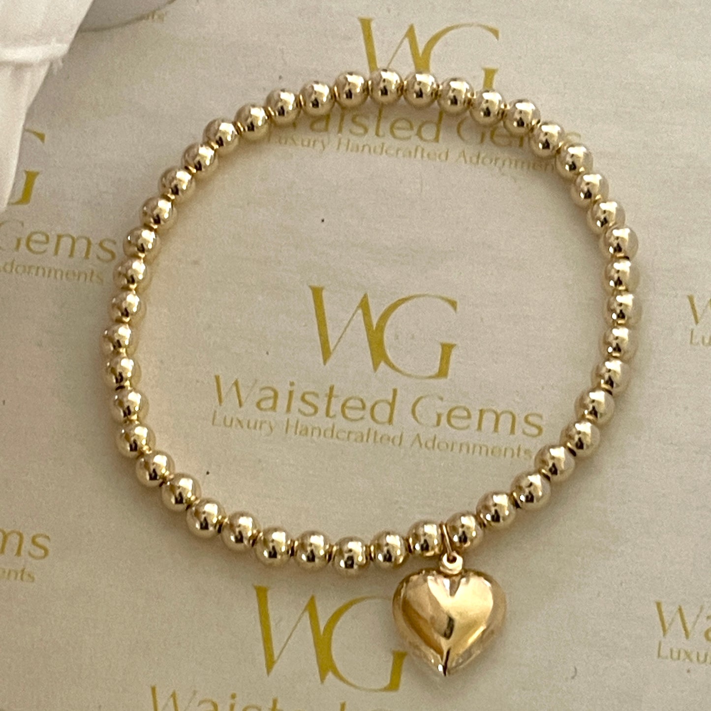 14k Solid Gold Heart Charm Bead Bracelet styled