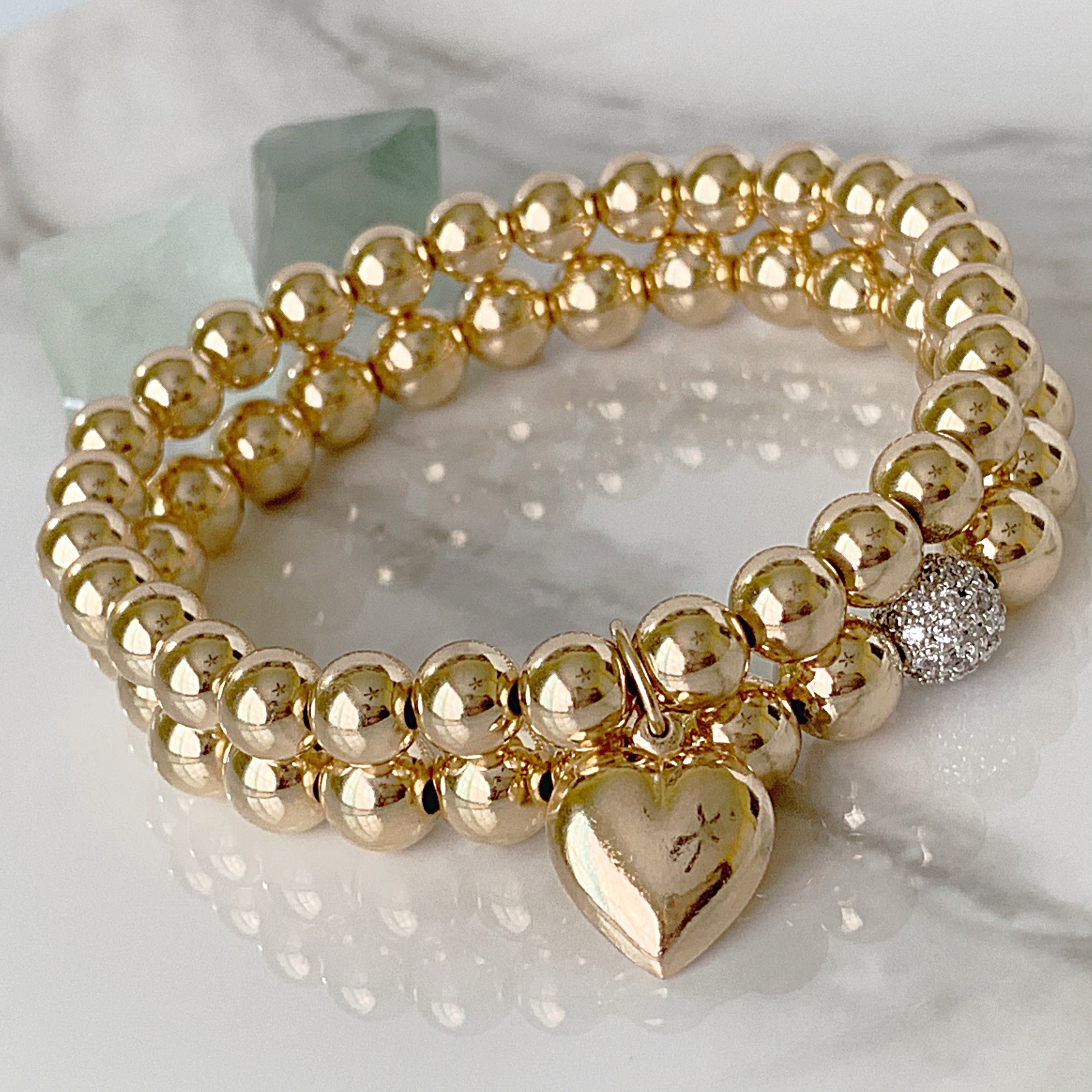 Gold filled heart charm bracelet detail