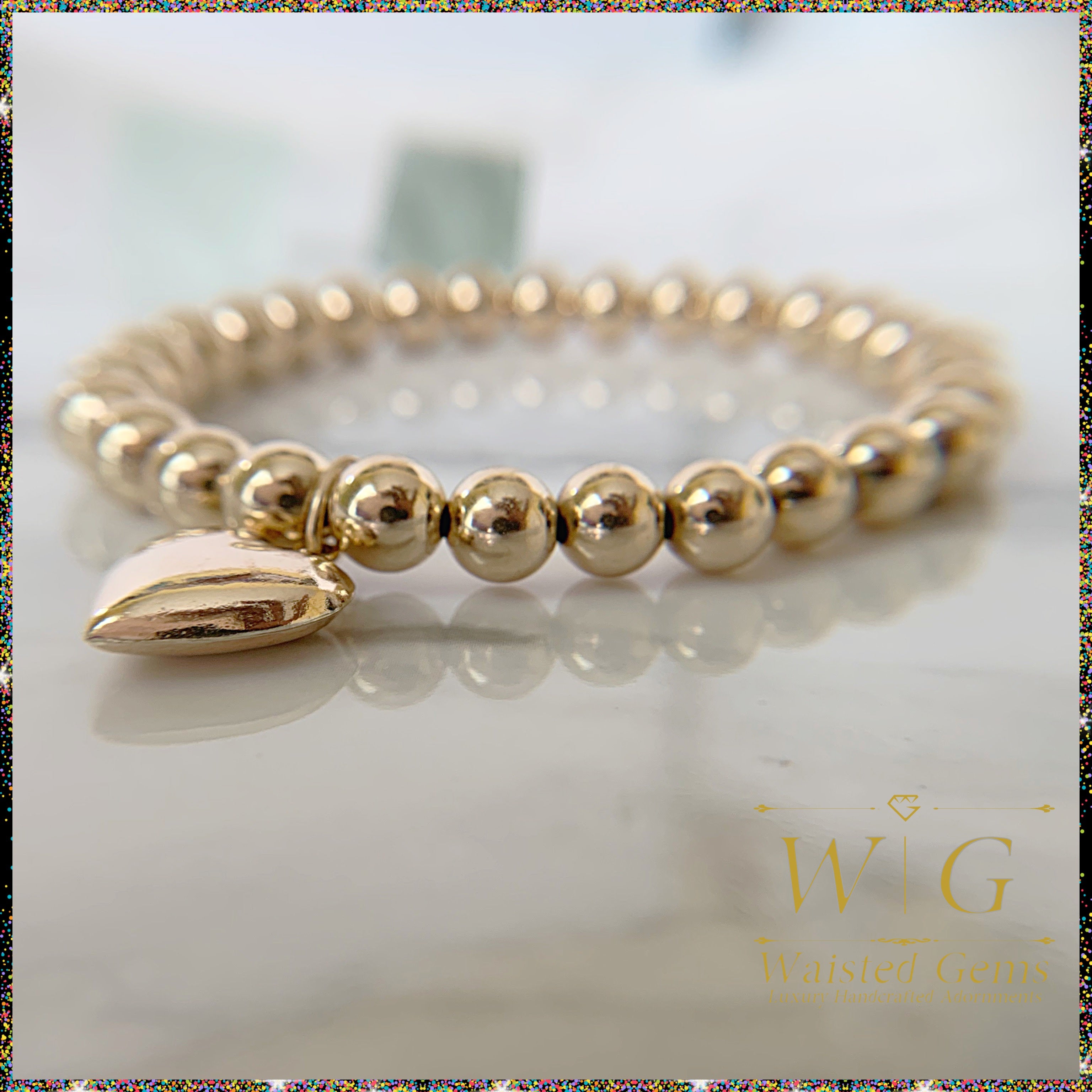 Solid Gold Beaded Heart Charm Bracelet