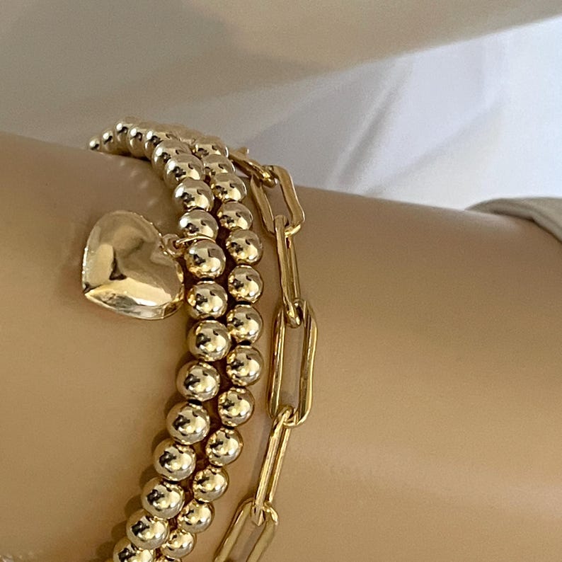 Solid Gold Heart Charm Bead Bracelet stacked
